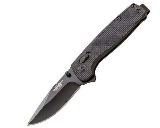 Manche ergonomique en fibre noire du couteau Joker JKR - prise en main confortable